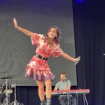 Natalie Imbruglia Instagram - All L💜VE from the crowd at @thebigfeastival yesterday!!! Our equipment didn’t arrive on time… But thanks to my amazing manager @sammymeads01 and my agent @chrisibbs and the wonderful @thebigfeastival crew… we rallied and borrowed instruments from @jakeshears @alexjameshq (THANK YOU!) for a heartfelt impromptu acoustic set 😜🌻 And BIG THANKS to my awesome crew and band who pulled it together and were AMAZING.. as always!! @ryanalexfarmery @paulmasondrums @henrikirgens @benlyonsmyth @rodclarkson Rob Jones Rik Hart Adam Barker @markhillslondon @caamusic @thebigfeastival @jakeshears @alexjameshq 📸 @karenrossiter Styling @fredericalovellpank Dress: @leolin_official @sal_morgan Shoes: @givenchy