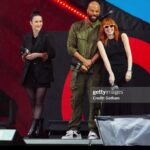 Natasha Lyonne Instagram - Thank you to @glblctzn, @common, @rachelbrosnahan for all the great work you do & to the brave crowd that came out in full force despite the rainstorm! @proenzaschouler @jackmccollough @lazro: I did my best to keep the gear safe n sound & I love you. ☔️🕊️☔️🕊️☔️🤍🤍🤍 swipe>>> 📸 @jameskaliardos 🤍