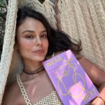 Nathalie Kelley Instagram - Could fashion come to the rescue of communities, ecosystems and ancestral knowledge… in the near future? That was the theme of @mrspress new book Wear Next that I was most excited to explore. Vogue’s first sustainability editor and host of one of my favorite podcasts Wardrobe Crisis, Clare’s book looks at the fashion innovators looking to “craft new satirical identities that don’t wreck the planet.” When it comes to innovation I like to look towards traditional communities and the ways in which their raw materials and fibers regenerate rather than pollute their landscapes. From the alpaca farmers and weavers in the Sacred Valley that create @moonrising.co’s beautiful ponchos, to the way @madeforawoman uses raffia palm from biodiverse forest systems in Madagascar to create beautiful and biodegradable clothes, bags and shoes. I am inspired by designers like @zazi.vintage who centre the makers of the clothes and much as those who model them. This is just a sliver of the future that @mrspress lays out for us in her fabulous new book. I highly recommend it - that’s why I offered my quote for the cover! I’m dreaming of the day we can be clothed in seeds rather than SKIMS (speaking of which - my top in the first photo is made entirely from Acai seeds and the Tucum fiber by artisans in the Amazon. It is sold by the lovely @yanciamazonia ) Who is with me? Seeds not Skims? Materials that come from standing forests not from dead trees! Clothes connected to ancestral ways of farming and stewarding the land! Fashion could return to its roots and be a source of inspiration for true beauty and justice… can we collectively dream and weave this future into being?