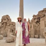 Nathalie Kelley Instagram - Luxor 🔺Karnak 🔺 Sekhmet 🔺 Hatshepsut 🔺 I fulfilled a lifelong dream in my visit to Luxor… I vaguely remember learning about Hatshepsut the female Pharoah in high school but it was wonderful to see her temple and learn about her devotion to biodiversity, traveling all of Africa to bring back seeds and trees for her famed gardens. Sadly since the building of the Aswan Dam in the name of “modernity” the Nile no longer floods and her gardens, like much of the once rich agricultural land along the Nile has gone barren and dry. I said my prayers to Sekhmet, goddess of divine retribution, to restore Justice and eliminate the greed that has poisoned so much of humanities consciousness. Thank you to @theheartofegypt for your warm and generous welcome to Luxor, and thank you to my Queens for the company 🔺