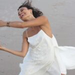 Nathalie Kelley Instagram - Imagine a future where our clothes are made not in factories but traditional villages: breathing new life into rich traditions and allowing artisans to continue their crafts with pride. A future in which our cotton came from biodiverse forests instead of monoculture fields. @sukkhacitta has made that dream a reality. With every purchase, you invest in the creation of fair work and infrastructure that alleviate poverty for mothers in rural areas of Indonesia, while supporting the last of Indonesia’s traditional cotton farmers. And lastly and most importantly- the clothes themselves are truly gorgeous. Bravo @sukkhacitta and thank you to my Byron bestie dream collaborator @peter_cellars for these beautiful snaps. You too are dream come true ❤️