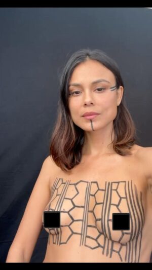 Nathalie Kelley Instagram - In the 10   years I’ve been on Instagram I have used my sexuality to grab attention, for my own validation and for various other reasons that I later came to to regret. But I’ve meditated deeply on sharing this video of my naked breasts - and I feel justified in sharing this private moment with the world - if it serves to bring attention to the issues I believe are urgent. It’s now clear to me, beyond any doubt, that @meta’s algorithm is actively suppressing my content regarding the levels of deforestation in the Amazon and Cerrado by multinational companies like @cargill @proudtobebunge. My stories with wonderful journalists and ngos such as @sumaumajournalism @stand.earth @standmighty about the fires raging across these biomes are also being deprioritized. 
While I’m well aware of the multiple crisis unfolding in the world that demand our attention, I feel compelled to speak up on behalf of indigenous women especially (like the Kayapó woman who painted my breasts in the design of a turtle, according to their tradition) who are on the frontlines of this violence. This is clickbait that begs you to dig deeper… to follow the money and see that many of those profiting from the destruction of some of the most biodiverse regions in the world, are at this moment flying to COP in Dubai, eager to portray themselves as the “heroes” in this story. But those who live here would tell you stories of  rivers and bodies poisoned with the very agro chemicals they are selling us.  Any promises they might make about deforestation need to be backed up with promises of restoring the biodiversity they have destroyed. If you pick up this story make sure you also talk about the tragic loss of species like the jaguar, of which only 300 Remain in the Cerrado - to make way for monocultures of soy used to feed industrially farmed animals in Europe, China and the US… may my naked breasts serve as an act of resistance against an algorithm actively suppressing stories that are trying to bring these urgent stories to the worlds attention. 🙏🏽