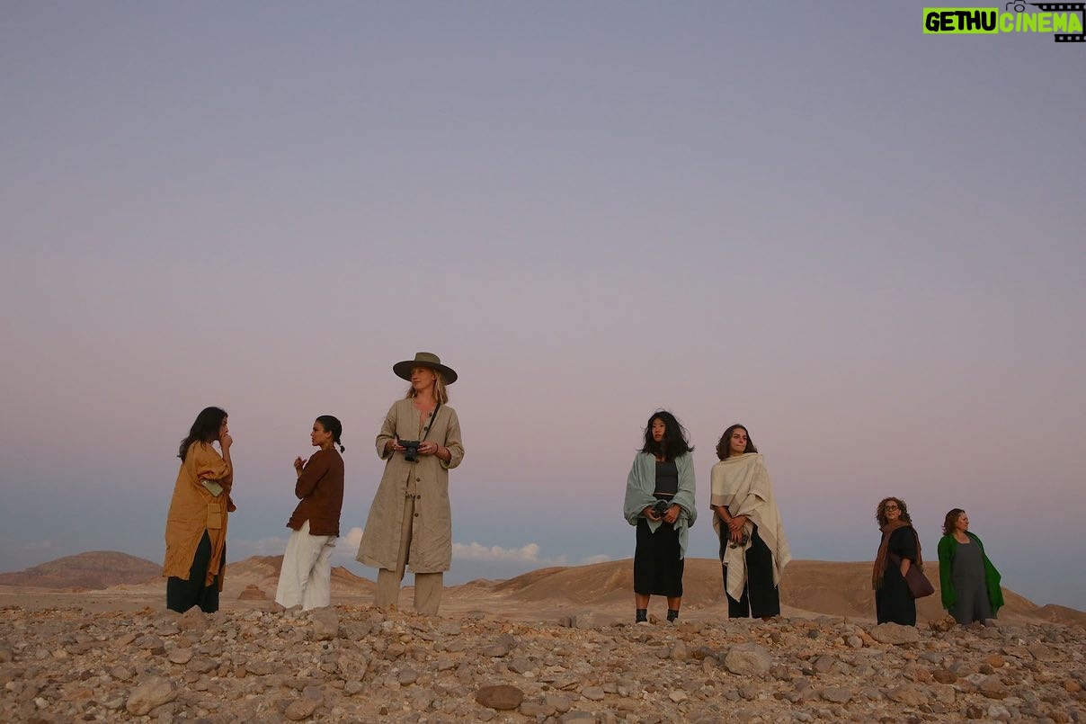 Nathalie Kelley Instagram - An escape into the Sinai desert with our Bedouin brothers to dream of new JUST and JOYFUL futures with these climate justice warriors; amongst us singers, storytellers and policy makers. Earlier that week Youseff, a Bedouin man had told me how grateful he was that we were bringing the climate change conversation to Sinai. He told me that the Bedouins are also very aware that the world is now out of balance… he said even when they go to eat their traditional foods, like goats - they are now finding plastic inside. :( On this particular sunrise we imagined a post plastic and fossil fuel future - a world in which our more-than-human family (the animals, fungi, trees, mountains and waters) were seen as KIN. Thank you @lilycole for facilitating this potent meeting of minds and hearts. (Also loving your recent name change to Lily Solar Power!) And thank you @louisderohan for capturing the magic of these desert moments. #COP27