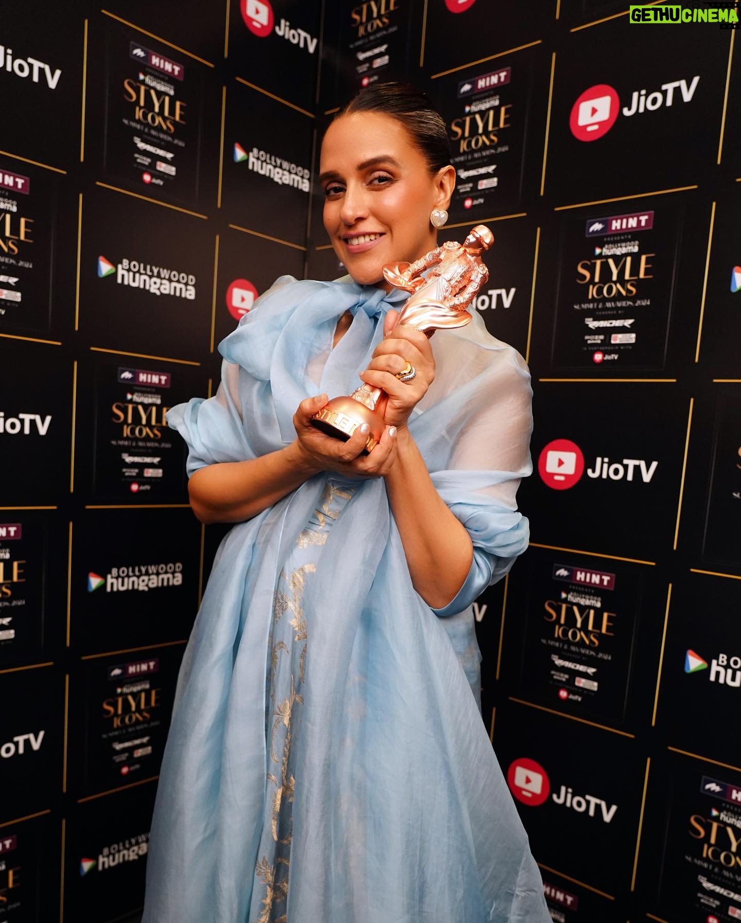 Neha Dhupia Instagram - Thank you @realbollywoodhungama for awarding me with THE MOST STYLISH MOULDBREAKING TALENT OF THE YEAR - FEMALE β¦ When I was leaving home last night all dressed in my ice π§ blue outfit our baby girl said βma you look like , ELSA β β¦ and I smiled back and said this Elsa Wil be home soon and tuck into bed with you. β₯οΈ Between being a princess in my baby girls eyes and breaking moulds jus by not trying to fit into any is where the magic πͺ happens. . . Be urself , caus eventually thatβs all that matters. Thank you @realbollywoodhungama @rohitkhilnani Neeraj sir @idohungama , Suleimaan sir @suleman_mobhani , Ryan @z3_us and the entire team for working tirelessly and putting up such a great show β¦ this award means so much. π- @reik.studio π - @sonicsmakeup @fouzikazi_makeupndhair @kapilcharaniya πΈ