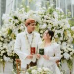 Nessie Judge Instagram - Akad Ceremony of Nessie & Andryan. - Photo & Video — @byputrida Exclusive Media Partner — @thebridestory Wedding Planner — @pure.organizer MUA @vinnagracia @vgmakeupstudio Bride’s Attire — @wirantikurniabride Groom’s Attire — @beskapan Shoes — @jimmychoo Ring — @tiffanyandco Decoration — @tuesdayproject Live cam — @viding.co Invitation — @invitto.printery Venue — @alilascbd