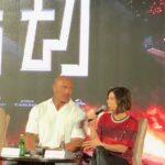 Neve Campbell Instagram – On stage again with @therock promoting our movie @skyscrapermovie in the incredible city of Hong Kong where the movie is set. Such an honor to be here. Breathtaking!!!! Thanks to my team for keeping me looking presentable. Makeup @coleencampbellolwell hair @marcmena styling @essi_m top @31philliplim pants #darrylk jewelry @tanachung_official