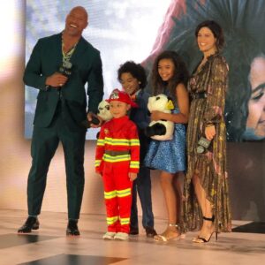 Neve Campbell Instagram - Having so much fun promoting our upcoming film @skyscrapermovie in the beautiful city of #Beijing ! Great to be reunited with my wonderful cast mates @therock @mckennarroberts @noah.cottrell 
and thanks to my fantastic beauty team makeup
@coleencampbellolwell hair @marcmena jewelry @tanachung dress @bashparis @legendary @universalpictures