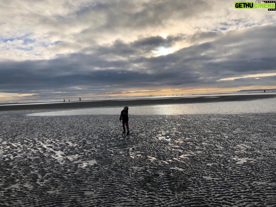 Neve Campbell - 14.4K Likes - A belated Happy New Year from a woolly English beach. Wishing everyone a stunning year to come. Xxx