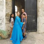 Nicole Ari Parker Instagram - Today my heart pounded as I stood in front of one of the two small windows...the only shaft of light..the only brief gust of wind inside the small female dungeon at #CapeCoastCastle. The spot that hundreds of shackled women surrounded by their dying sisters and children were forced in desperation to fight for... beg for..die for. A brief moment in the sun. A long visit to #CapeCoastCastle and #ElminaCastle was what I needed Sophie and Nicolas to experience. To see. To listen. To understand. They are two of the last remaining sites along the GoldCoast that bear witness to over 300 years of the brutality and horrors of the slave trade. We saw the powerful Nkyinkyim installation by artist Kwame Akoto-Bamfo depicting in terracotta the faces of people enslaved here. We walked thru the Door of No Return, following the path our ancestors took as they boarded ships. Then our guide #MrBlankson turned us around and we went back thru the same door...symbolizing our return. When we arrived at #ElminaCastle and Sophie saw the tiny door she had only read about..We stood in silence and then we prayed. 🇬🇭 Namanom yɛ hyɛ him ɛnyimnyam, yɛ da hom ase dɛ homdze bin aba fie.🇬🇭 Ancestors we honor you. We thank you for bringing us home.