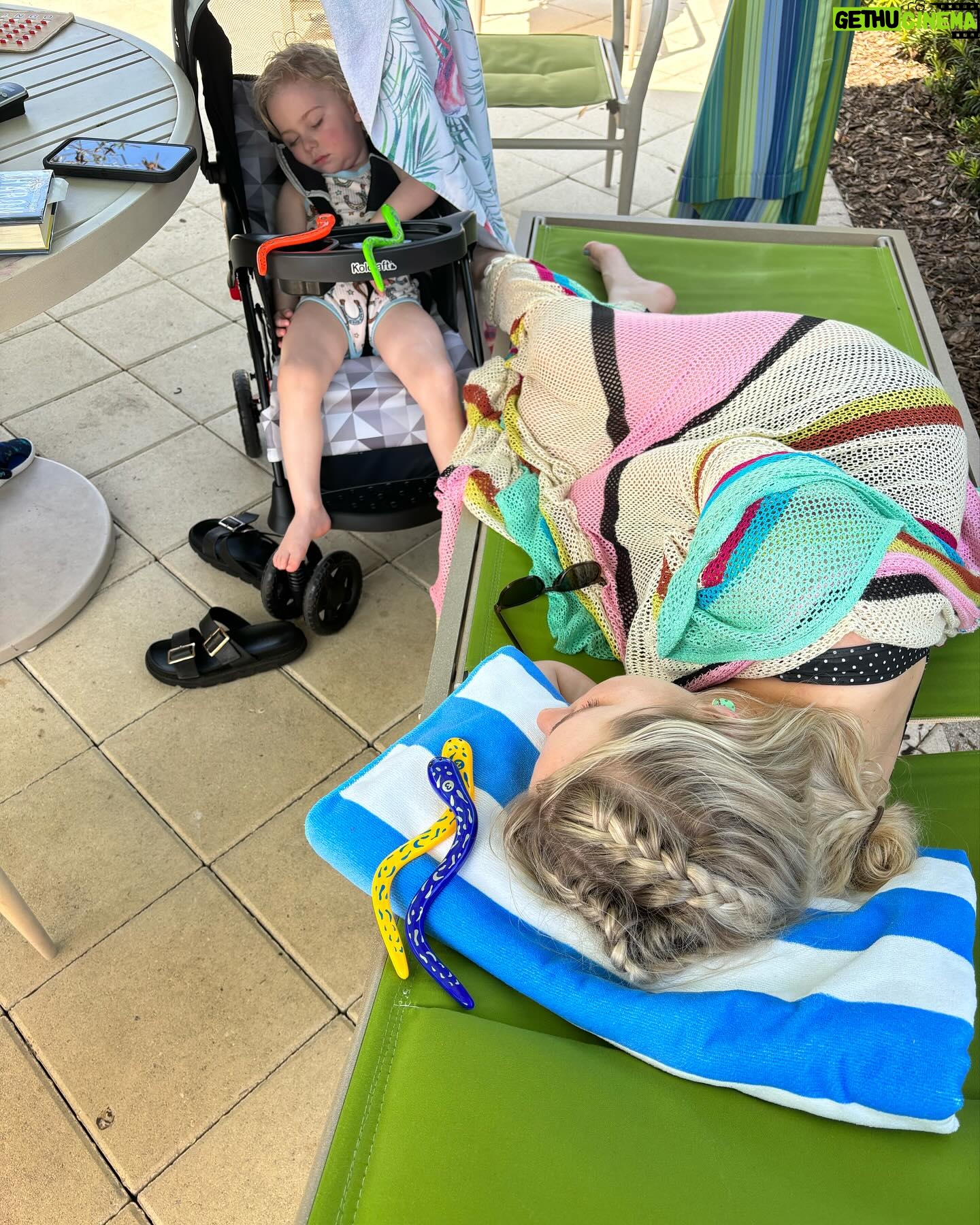 Nicole Franzel Instagram - Cabana day 🌞🏖️ aka chasing Arrow anywhere and everywhere until he tires (swipe to see the last pic 😂) I thought maybe I’d get a frozen mock tail and read my book when he napped but a nap was more beneficial for me as well 😜