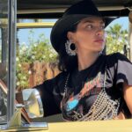 Nicole Lynn Williams Instagram - Living my best desert life 🌵 🤠 Custom Beaded Bra and earrings @jesuisjeniece @jeblancisalive