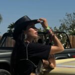 Nicole Lynn Williams Instagram - Living my best desert life 🌵 🤠 Custom Beaded Bra and earrings @jesuisjeniece @jeblancisalive