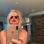 Nicollette Sheridan Instagram - Picking a good red... #lipstick Might have to come up with my own line 😜 If you can guess the brand and color...I’ll send it to you!!! 💋💄💋