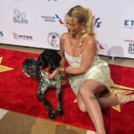 Nicollette Sheridan Instagram - My darling @k9_buda, Thank you for your courage and bravery and of course your love and dedication to your daddy and your country…I loved snuggling with you on the carpet before presenting your well deserved 2023 Military Hero Dog Award. I hope to relax and play ball with you one day…until then, be safe and know you are appreciated and loved! ❤️ @americanhumane @herodogawards @thebreakers