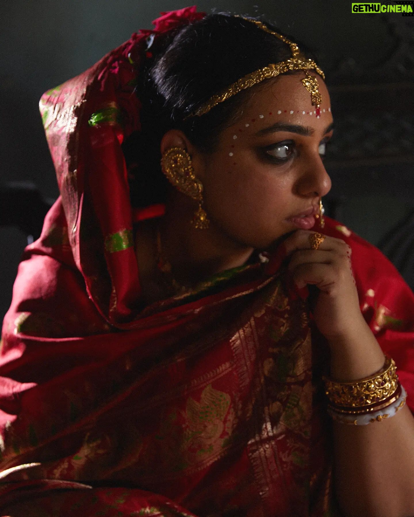 Nithya Menen Instagram - Mrinmoyi from Samapti, directed by Satyajit Ray (based on Tagore's short story of the same name). It is a love story, which shows the journey of its lead character Mrinmoyi from being an unruly and carefree young girl to a loving wife. Reimagine is an attempt to take a fresh look at the character and spinning a new story out of them. But all are re-interpretations with an intriguing approach while retaining the visual essence of the original works. Creative direction and styling, make up done by @rishabhad Clothes @parama_g Photography @sauvicksengupta