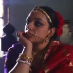Nithya Menen Instagram - Mrinmoyi from Samapti, directed by Satyajit Ray (based on Tagore's short story of the same name). It is a love story, which shows the journey of its lead character Mrinmoyi from being an unruly and carefree young girl to a loving wife. Reimagine is an attempt to take a fresh look at the character and spinning a new story out of them. But all are re-interpretations with an intriguing approach while retaining the visual essence of the original works. Creative direction and styling, make up done by @rishabhad Clothes @parama_g Photography @sauvicksengupta