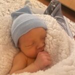 Olivia Munn Instagram – My Golden Ox baby. Malcolm Hiệp Mulaney. Happy Holidays. ❤️💚
