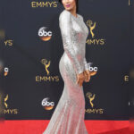Padma Lakshmi Instagram – Choose your fighter! Emmys looks from over the years 💋