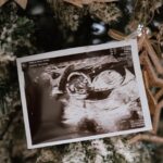 Pamela Bowie Instagram - Merry Christmas everyone! Our family is growing by two tiny feet! Wishing you a joyful holiday season filled with peace and love 🤍🎄👶🏻