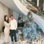 Pamela Bowie Instagram - Merry Christmas everyone! Our family is growing by two tiny feet! Wishing you a joyful holiday season filled with peace and love 🤍🎄👶🏻