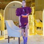 Pamela El Kik Instagram – من لحظة ما وصلت على مطار #الرياض #السعودية لأيّ مكان تواجدت في، انغمرت بِحُبّ شعبو والبسمة الحقيقية وحسن الضيّافة اللي ما إلا وصف👑
ممنونة ومشكورة لكل نقط الحُب 🇸🇦
#أنا_عربية
•••
I decided to support a young talent from my country by wearing a full look from Nour Takieddine’s D2D collection.
•A collection inspired by the Dada art movement, created as a reaction to the violence and absurdity of world war 1.
In such hard times, I believe in the power of art as a great way to express our emotions, and rebel against the way our world functions today.
•Nour Takieddine’s collection was a perfect fit for my way of thinking, and I really wanted to wear this look tonight that consists of an extravagant jacket, with a fully hand embroidered back illustration of Emmy Hennings.
I saw a part of me in this woman, and that was an extra reason for me to pick this specific look.
•Hennings was a bold artist, poet, and performer who fought so much for her thoughts and questioned a lot the societal norms. All the handwork on the back of this jacket started from a one line drawing technique done by Nour, representing an autoportrait of Emmy.
•The look also consists of an asymmetric skirt that has a deconstructed waistline, and a curvy hem another way to rebel against what we think is ‘normal’, the outfit is embellished with plexy laser cut elements representing words and geometric shapes referencing Dadaist paintings and exploring new materials that are considered odd or weird applied on fabric.
• to complete the look with these special heels with hand embroidered abstract faces inspired by DaDa collages and plexy embellishments ✨
@n.tbynour 🧡