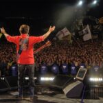 Paul McCartney Instagram - Paul performing at Glastonbury Festival, 2004.⁣ ⁣ "The crowds at Glastonbury have always reminded me of a medieval battle scene - it looks very heraldic, and to see this iconic scene and particular Glastonbury ‘look’ was very exciting.” - Paul⁣ ⁣ Less than 90 days until Paul returns to @glastofest headlining the iconic Pyramid Stage on Saturday 25th June! 🎸⁣ ⁣ #TBT #ThrowbackThursday #Glastonbury