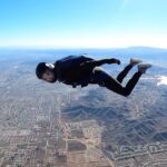 Pom Klementieff Instagram – Working on back flying, tracking and dead bug exit I guess? 😂🪂💕 jump 129!