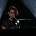 RAYE Instagram - My first US tv performance on @colbertlateshow performing escapism. I was so nervous and stupidly wore long nails playing the piano 🥲 but so grateful for the opportunity 🌃♥️🇺🇸🥹