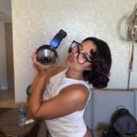 RAYE Instagram - 24 hours in vegas 🎰 always w my Dyson zone 🤓 #ad