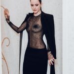 Rachel Brosnahan Instagram - Thank you @voguemagazine for a beautiful night at the Met and thank you to the brilliant @sergiohudson for this 90’s inspired gothic dream of a gown. 🕸️ 🖤🕷️ Shout out and major thanks to the village that makes this glamorous world go round… styling by @mandelkorn, makeup @lisaaharon, hair @owengould, hair color @kittycolorist, nails @geeznails, jewels @simongjewelry, and Charles, Devin, Michael and Geri from Team Sergio. 📷: @theemmaexperience