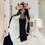 Rachel Brosnahan Instagram – Thank you @voguemagazine for a beautiful night at the Met and thank you to the brilliant @sergiohudson for this 90’s inspired gothic dream of a gown. 🕸️ 🖤🕷️

Shout out and major thanks to the village that makes this glamorous world go round… styling by @mandelkorn, makeup @lisaaharon, hair @owengould, hair color @kittycolorist, nails @geeznails, jewels @simongjewelry, and Charles, Devin, Michael and Geri from Team Sergio. 📷: @theemmaexperience