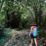 Rachel Hollis Instagram - I’ve dreamed of walking the Camino de Santiago for YEARS but couldn’t figure out how to pull it off with four kids (The 500 mile pilgrimage typically takes at least 40 days) But, for the first time ever, all my kids are at summer camp at the same time!! So I realized —while not conventional— I could take on the Camino in stages. So… Flew to Spain and started walking. 20 miles. Then 13 miles. Then 16 more. Drank a lot of espresso. Ate a lot of bread and cheese. Stayed the night in Pensions. Drank more coffee. And beer. And pintxos… so many pintxos. Broke out in tremendous blisters and hives (more on that later) kept freaking walking. Ancient roads from the 1100’s. The most beautiful Basque Country you can imagine. One million cowbells tinkling as you pass. Random strangers who offer you coffee and invite you in to use their restroom. Buen Camino! So hard. So good. So grateful. Gracias por todo. Eskerrik asko. What a memory! ✨ Until next time… #caminodesantiago
