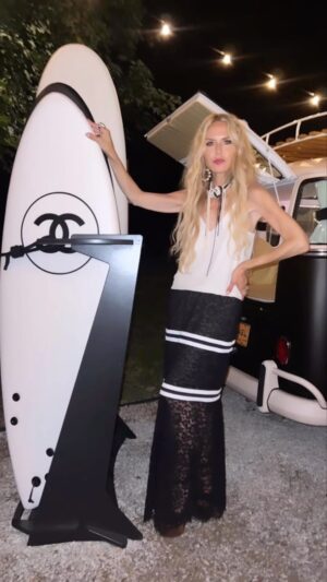 Rachel Zoe Instagram - Another night to remember with  @chanelofficial filled with great friends and the beautiful talented DJ @isabellamassenet ..please count me in for the #CHANELontour I will happily roll in the @chanelofficial 🚐 van and ride the surf board for life 🖤 🤍🖤🤍 Wearing vintage Chanel Dress @whatgoesaroundnyc and my personal vintage Chanel jewels