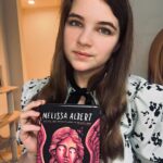 Raegan Revord Instagram - Ready for a thriller? In The Bad Ones by Melissa Albert, a small town awakens one winter morning to find out that four people have vanished in the night without a trace. Nora’s estranged best friend, Becca, is one of the lost. Nora sets out on a journey to find her friend, but along the way, makes shocking discoveries about the town’s past and learns that not everything is as it seems. This spooky blend of horror and fantasy captured me with Nora and Becca’s story, and didn’t let me go even as the dark mysteries of the town unraveled! I definitely recommend it for those of you who love a good scare every once in a while! 👻 #readwithraegan #bookstagram #readersofinstagram #bookrecommendations #bookclubfaves #horror #fantasy #thriller #fiction