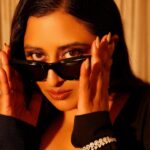 Raja Kumari Instagram - The face card never declines 💸🖤 Artist of the Year ✨last night for @elleindia #ElleList wearing custom @labelmanikananda Diamonds by @mahesh_notandass @vandalsworld_unofficial Shades @bottegavenetaworld Heels @louboutinworld Styled by @tryagaintoobad @styled_by_meera Glam @riyasheth.makeuphair Shot by @dinesh_ahuja Location @tajlandsend