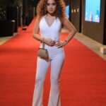 Rana Raeis Instagram - All white for tonight🤍 #gff20 @elgounafilmfestivalofficial Jumpsuit by: @paulafashionhouse My favorite : @saeedramzi Makeup by💄: @abdallahelrefaeii And i want to thank @ghadaabahaa 💋