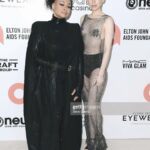 Raven-Symoné Instagram – @mirandamaday and I went to the Elton John AIDS foundation party last night!  Styled by: @jskystyle  Custom cape and gloves: @breabstar  Boots by: @afffair.fff  Beaded dress: Vintage.  Hair by: @cree8tivelooks  Makeup: @adamchristophermakeup