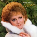 Reba McEntire Instagram - This week marks the 36th anniversary of my album, #MerryChristmasToYou. Comment your favorite Christmas song below! 🎄 Stream at the link in bio!