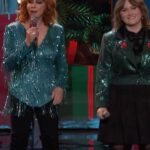Reba McEntire Instagram – bopping around to @reba & @rubyleighofficial’s JOLLY duet to “Rockin Around the Christmas Tree”🎄🥳