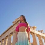 Rebecca Chen Instagram – That Greek sunset shining on the acropolis 🏛️ ✨ 

Wearing @pinacolada.bali 
Shot by @sweetnsour_vision 

#greece #athens #acropolis #parthenon #acropolisathens #greeksunset