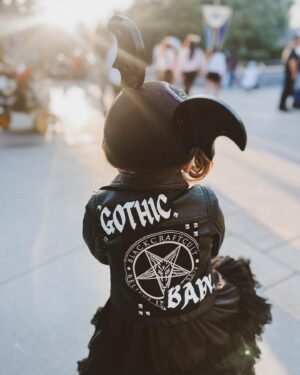 Rebecca Victoria Hardy Instagram - Dark paradise 🖤🦇🕸️
Ears: @batsday 
Jacket: @blackcraftcult 

#disneyland #gothicbaby #batsday #alt #goth #mommyandme