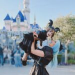Rebecca Victoria Hardy Instagram - Dark paradise 🖤🦇🕸️ Ears: @batsday Jacket: @blackcraftcult #disneyland #gothicbaby #batsday #alt #goth #mommyandme