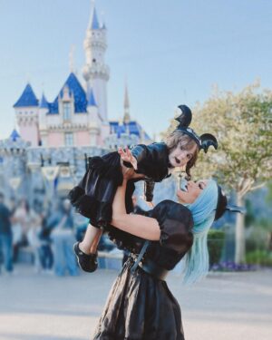 Rebecca Victoria Hardy Instagram - Dark paradise 🖤🦇🕸️
Ears: @batsday 
Jacket: @blackcraftcult 

#disneyland #gothicbaby #batsday #alt #goth #mommyandme