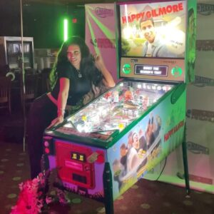 Rebecca Victoria Hardy Instagram - Thank you @killatrav for reppin my game 🙏🏽🖤 #happygilmore #pinball #gamedesigner #hardypinball #rebyhardy