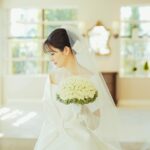 Rika Adachi Instagram - みなさまに支えられながら 無事に挙式を終えたことを報告させてください🌸 アニヴェルセルみなとみらい横浜 @anniversaire_minatomirai で エマリーエ @emarie_wedding のドレスを着て 素敵なブーケ @yuji_kobayashi_ を持ちながら おすぎさんメイク @hair_make_osugi で LUCKMANさん @n.k.luckman 原野さん @bees_photo_harano そして #Smgカメラ に写真を撮っていただく… 夢がたくさん叶いました🥺🤍 まだまだ公式の写真が届かないのですが、ひとまず #Smgカメラ の写真でご報告まで… 披露宴の方もとても豪華にしていただいたので、また改めて写真とともに振り返りたいです🫶🏻 本当にご協力いただいたみなさま ありがとうございました🙂‍↕️👏