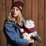 Riley Voelkel Instagram - The “Catvamp” Beanie ⁣⁣ Drops tomorrow 6pm PST online (link in bio) and at the @epiccons #IWFF convention! @merchbyblankclo #blankclo #rileyvoelkel #merchdrop #alwaysandforever ⁣#QuentinMeowantino Shot by @mike.c.robertson