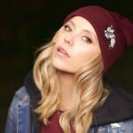 Riley Voelkel Instagram - The “Catvamp” Beanie ⁣⁣ Drops tomorrow 6pm PST online (link in bio) and at the @epiccons #IWFF convention! @merchbyblankclo #blankclo #rileyvoelkel #merchdrop #alwaysandforever ⁣#QuentinMeowantino Shot by @mike.c.robertson