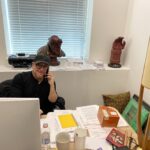 Ron Perlman Instagram – My manager of 72 years @erikkritzer , hard at work convincing Hollywood I am 46 yrs old. Surrounded by #HellboyBust, #RightHandOfDoom, and a box of Cubanos from my recent location scout. He changes decors every time a different client pays a visit.