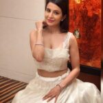 Roop Durgapal Instagram - What would you do If you weren’t afraid ? 🎭 . . . . Outfit @rajkumari_by_richahaware . . . . #reelitfeelit #reelkarofeelkaro #explorepage #reelsinstagram #reels #trendingreels #reelsviral #viralvideos #RoopDurgapal #whitedress #indianwear #lehenga #lehengas #pearl