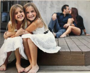 Rosa Blasi Instagram - My favorite family photo from 6 years ago 📸 by @laurentlevy that hangs in my bedroom. You can feel the excitement from these two little girls who suddenly found themselves a sister (just 6 weeks in age apart). #modernfamily #fate #newbeginings #2013